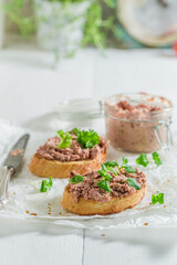Tasty and fresh bruschetta with fegatini and parsley for breakfast.