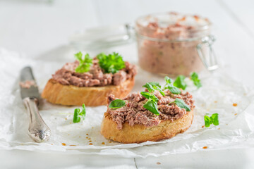 Healthy and delicious bruschetta with fegatini and parsley as snack.