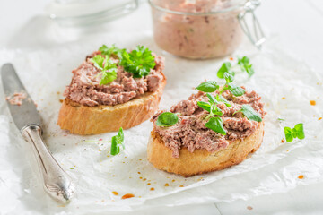 Crisp and hot bruschetta with fegatini and parsley for breakfast.