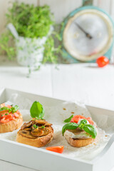 Healthy and delicious various bruschetta as classic snack for breakfast.