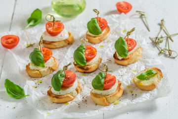 Fresh and tasty crostini made with mozzarella and tomatoes