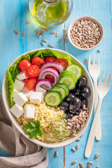 Healthy Greek salad in the fit version with buckwheat groats.
