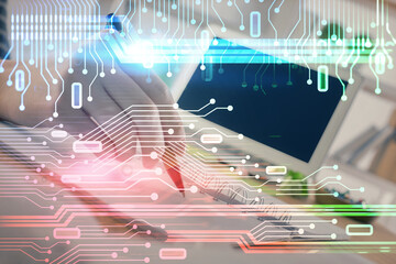 Double exposure of hands making notes with digital coding icons. Computer learning concept.