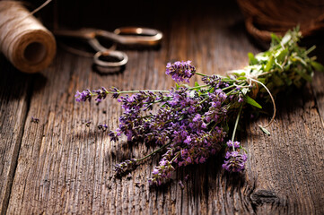 Bunch of lavender on a rustic wooden table, close up view