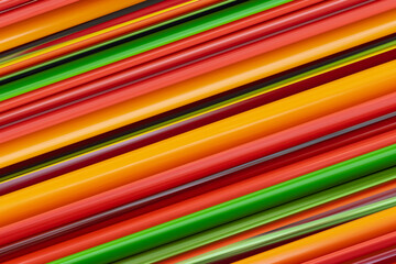 Obraz premium abstract pattern multicolored with bright lines yellow and red stripes oblique close-up