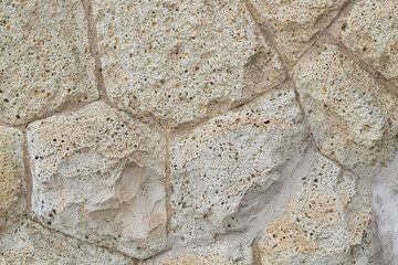light gray stone background uneven tiles with lines close-up