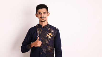 Indian collage boy wears ethnic or traditional outfit kurta / cloths. Male fashion model in...