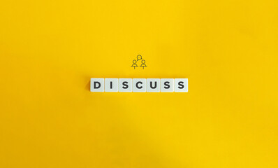 Discuss Word on Letter Tiles on Yellow Background. Minimal Aesthetics.