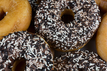 Closeup View of Assorted Donuts on a White Plate