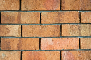 Obraz premium Clay brick block structure wall surface. Interior decoration and background textured photo.