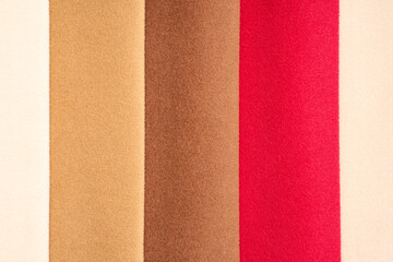 Fabric texture close up. Fabric swatches in different colors are stacked for selection. Catalog and palette tone of Interior fabric for furniture, closeup. 