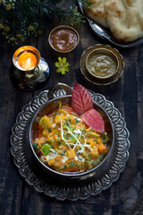 Mixed Vegetable with roti served in dish isolated on dark background top view