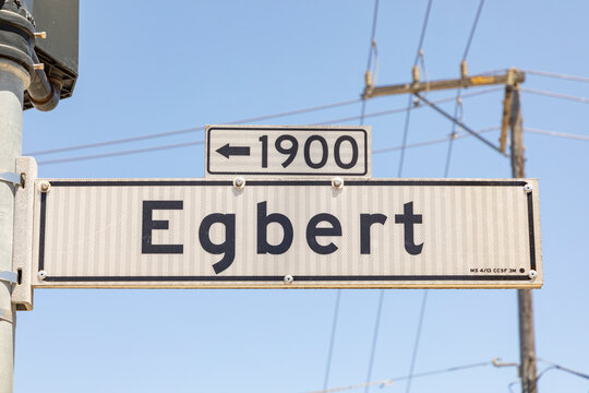  street name Egbert in San Francisco in typical white signage with black letter.