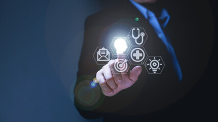 Businessman's hand touches virtual man's head button. Idea. Spark business idea. business goals and achievements with new concept copy space.