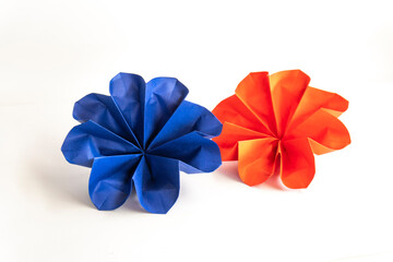 origami paper flowers on white background