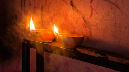 Candles close-up in the Indian Temple on a Religious Festival Diwali. Oil Lamp