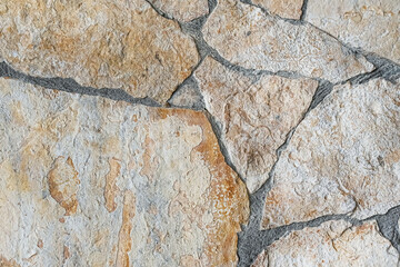 stone background from tiles with gray lines texture brown
