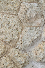 vertical pattern gray stone background closeup of cobblestones with lines