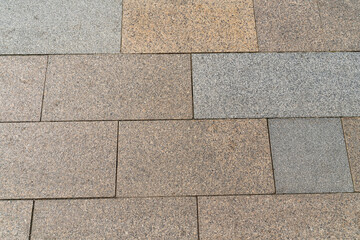 brown stone tiles close up, city square from tiles