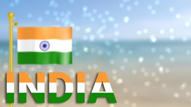 Indian flag textured India word isolated on beach Floating circles and waving Indian flag in blur view.