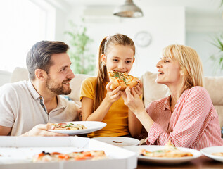pizza family child food home eating daughter mother father happy meal together lunch dinner man...
