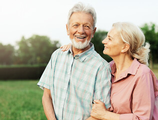 woman man outdoor senior couple happy lifestyle retirement together smiling love fun elderly active...