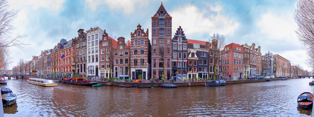 Panorama of the city embankment of Amsterdam on a sunny day.