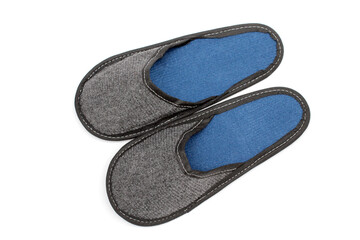 Gray textile slippers with blue insole, house slippers isolated on white background, home clothes, top view
