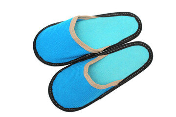 Blue textile slippers with turquoise insole, house slippers isolated on white background, home clothes, top view