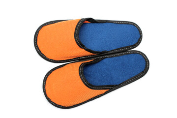 Orange textile slippers with blue insole, house slippers isolated on white background, home clothes, top view
