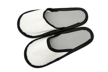 white textile slippers with gray insole, house slippers isolated on white background, home clothes, top view