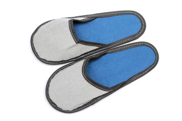 Gray textile slippers with blue insole, house slippers isolated on white background, home clothes, top view