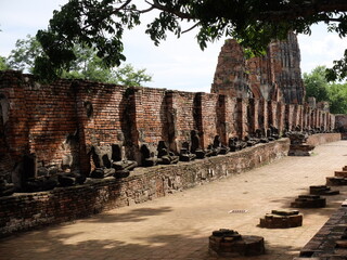 Abandoned Buddha statues in the Ayutthaya Historical Park, Wat Phra Mahathat of Phra Nakhon Si...