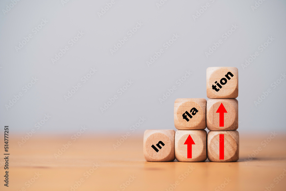 Aufkleber inflation wording print screen on wooden cube block with red up arrow for increasing of inflation an