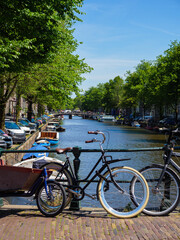 Amsterdam with river and houses in the city
