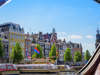Fototapeta premium Amsterdam houses and river in the city