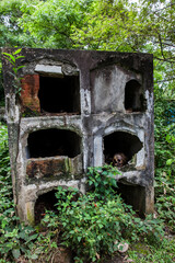 Desecrated graves in the cemetery of the old town of Armero destroyed by an avalanche caused by the Nevado del Ruiz Volcano in 1985 in Colombia