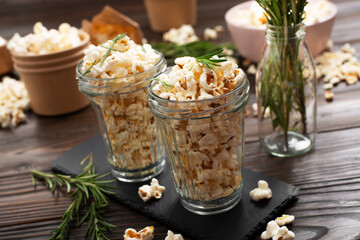 Glasses with popcorn on slate tray on kitchen table