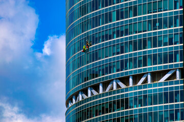 washing the windows of a skyscraper