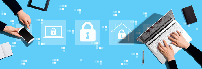 Cyber security theme with two people working together
