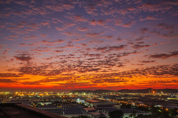 Beautiful sunset sky over city Pattaya Chonburi. Twilight over the urban district