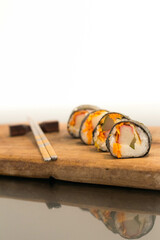 sushi with chopsticks