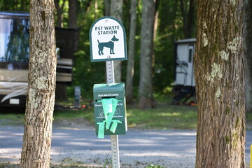 Dog waste station sign with bags