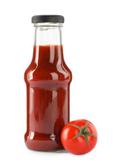 Glass bottle of tasty ketchup and fresh tomato isolated on white
