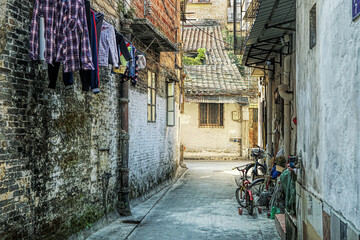 Around hutongs in Foshan, Guangdong, China, which are a type of narrow streets or alleys in typical neighborhoods with old houses. 