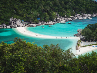 Scenic high angle view of Koh Nang Yuan Island viewpoint. Close up look of iconic white sand bar, clear turquoise sea with coral reef. Near Koh Tao Island, Surat Thani, Thailand. Diving spot.