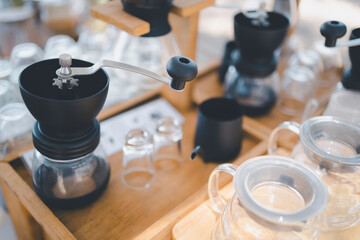 Fototapeta na wymiar Coffee grinder kettle dripper, Coffeemaker equipment in cafe