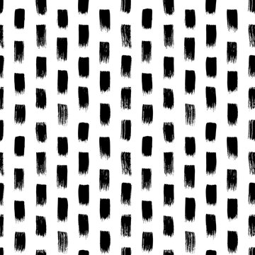 Short hand drawn strokes vector seamless pattern. Texture in hipster style with vertical black brush strokes. Abstract monochrome grunge style background. Black paint dry bold short lines. 