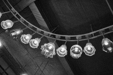 The interior of the hall of the shopping center. Lamps on the ceiling close-up