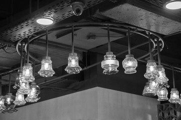 The interior of the hall of the shopping center. Lamps on the ceiling close-up